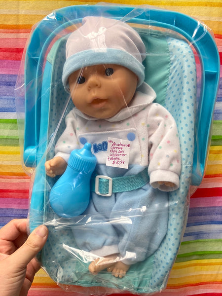 Anatomically correct boy doll w/ carrier and bottle
